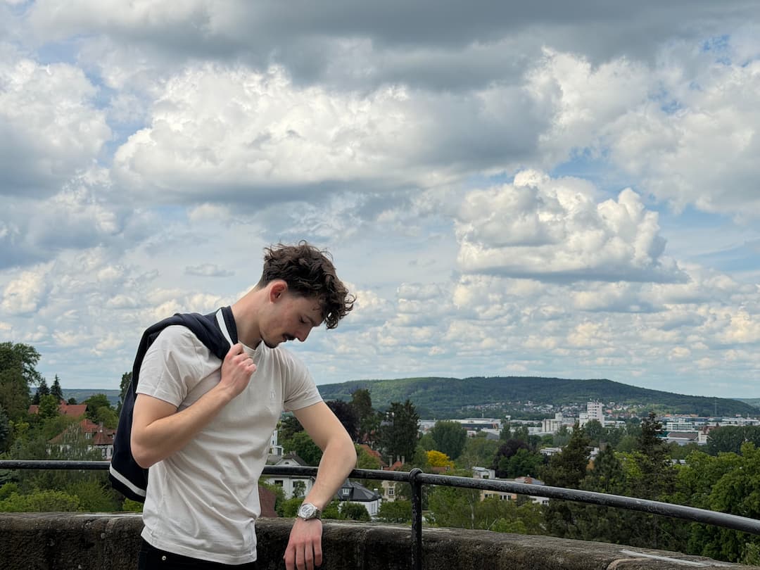 Vintage White — The Standard T-Shirt above the city