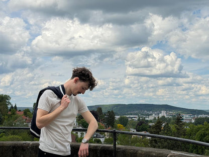 Vintage White — The Standard T-Shirt above the city