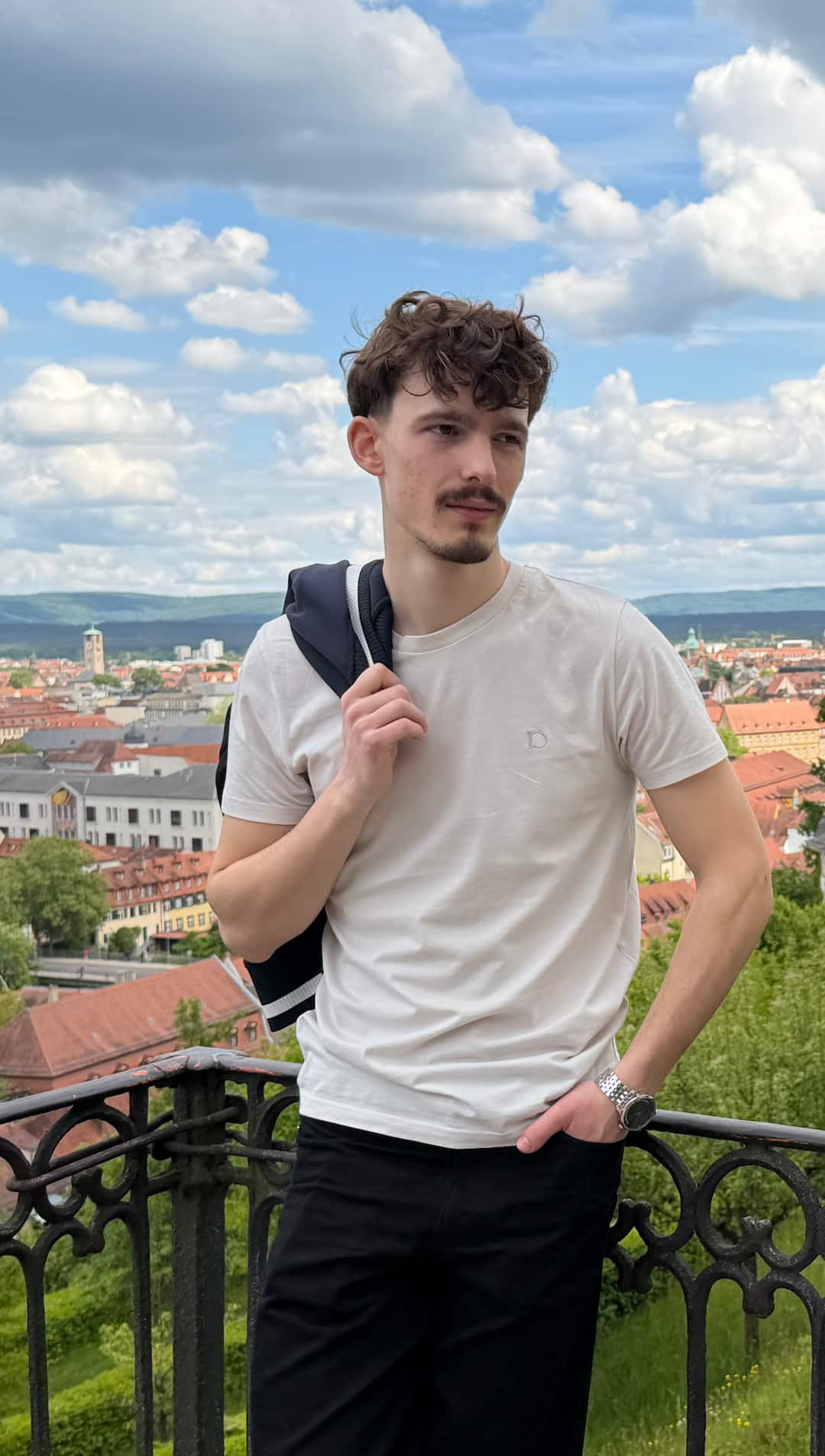 Vintage White — The Standard T-Shirt above the city