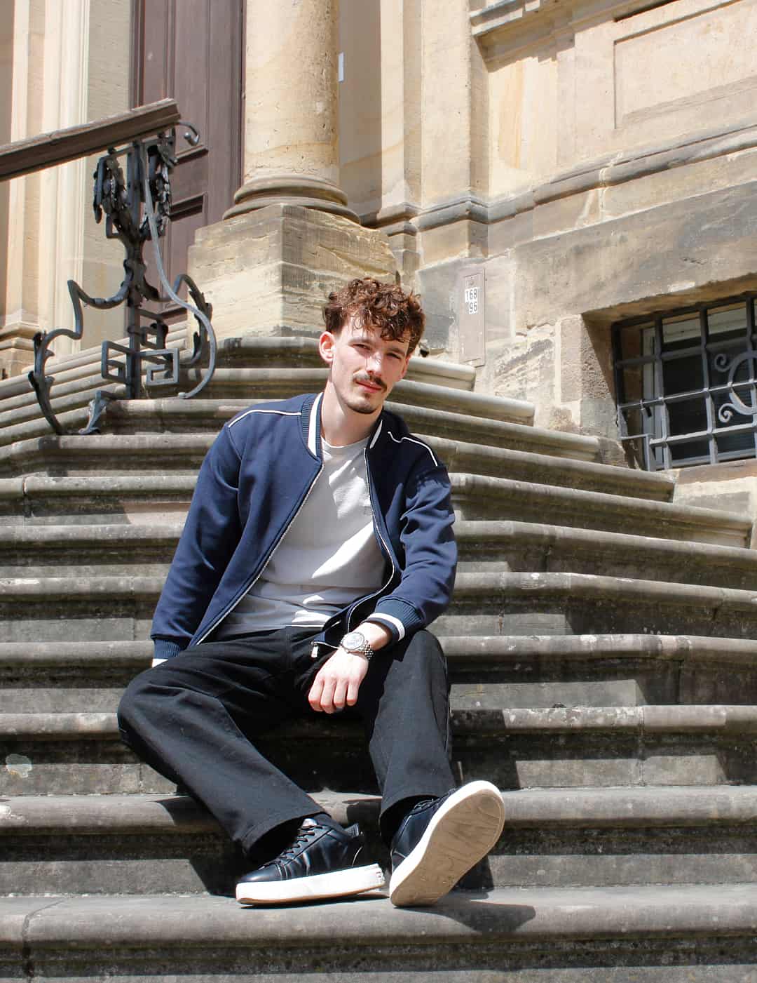 Navy Blue — The Standard Bomber on the steps