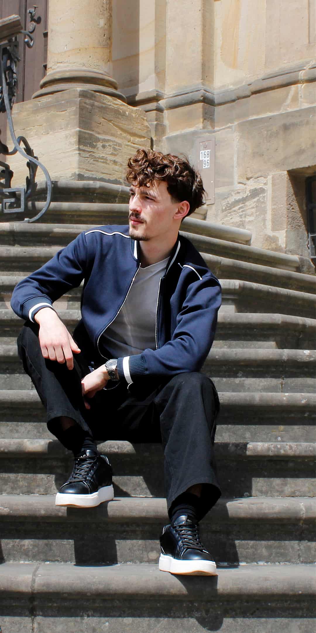 Navy Blue — The Standard Bomber on the steps