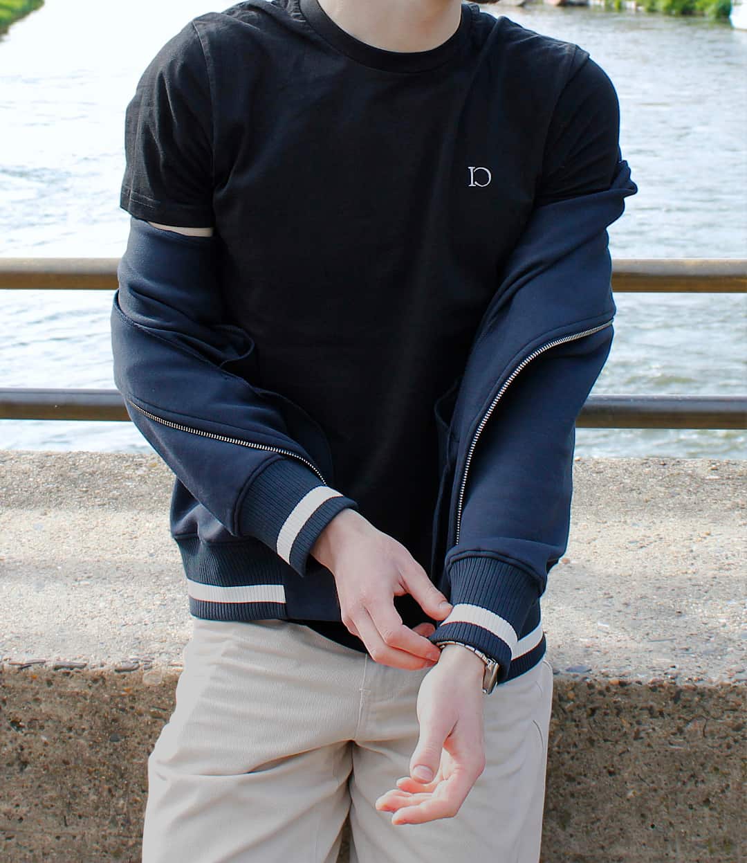 The Standard Bomber in navy, worn by the river